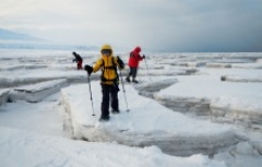 snowshoeing on frozen sea in Spitzbergen